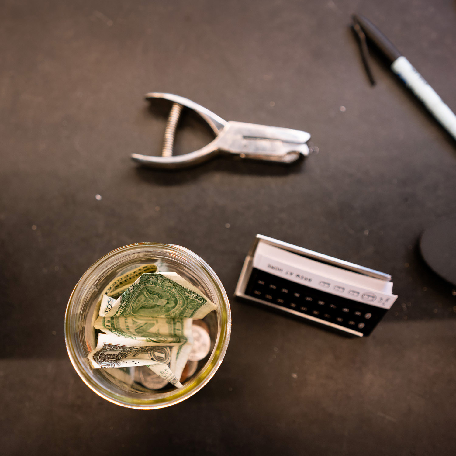 Photograph: tip jar still life seen from above